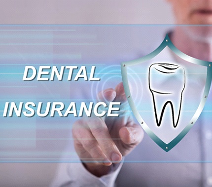 A person touching a screen that reads “Dental Insurance” and contains an image of a tooth