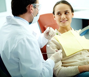 Patient learning about how dental implants in Hillsboro work