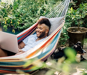 a person sitting in a hammock