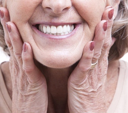 senior woman smiling up close