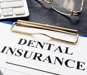 dental insurance form on clipboard 