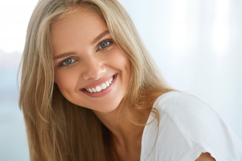 closeup of a young woman smiling