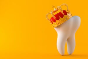 Tooth with a royal crown on it