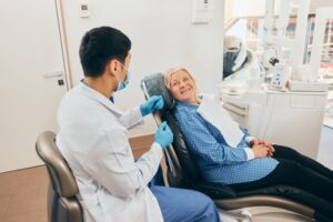 Senior patient consulting with her dentist 